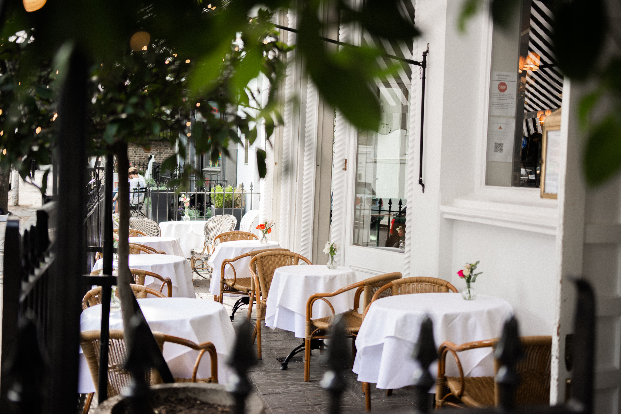 Restaurant terrace with crisp white table linen